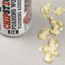 Close-up of Chipstick D4 foaming wood flooring adhesive bottle with expanding PU foam applied on a material surface.